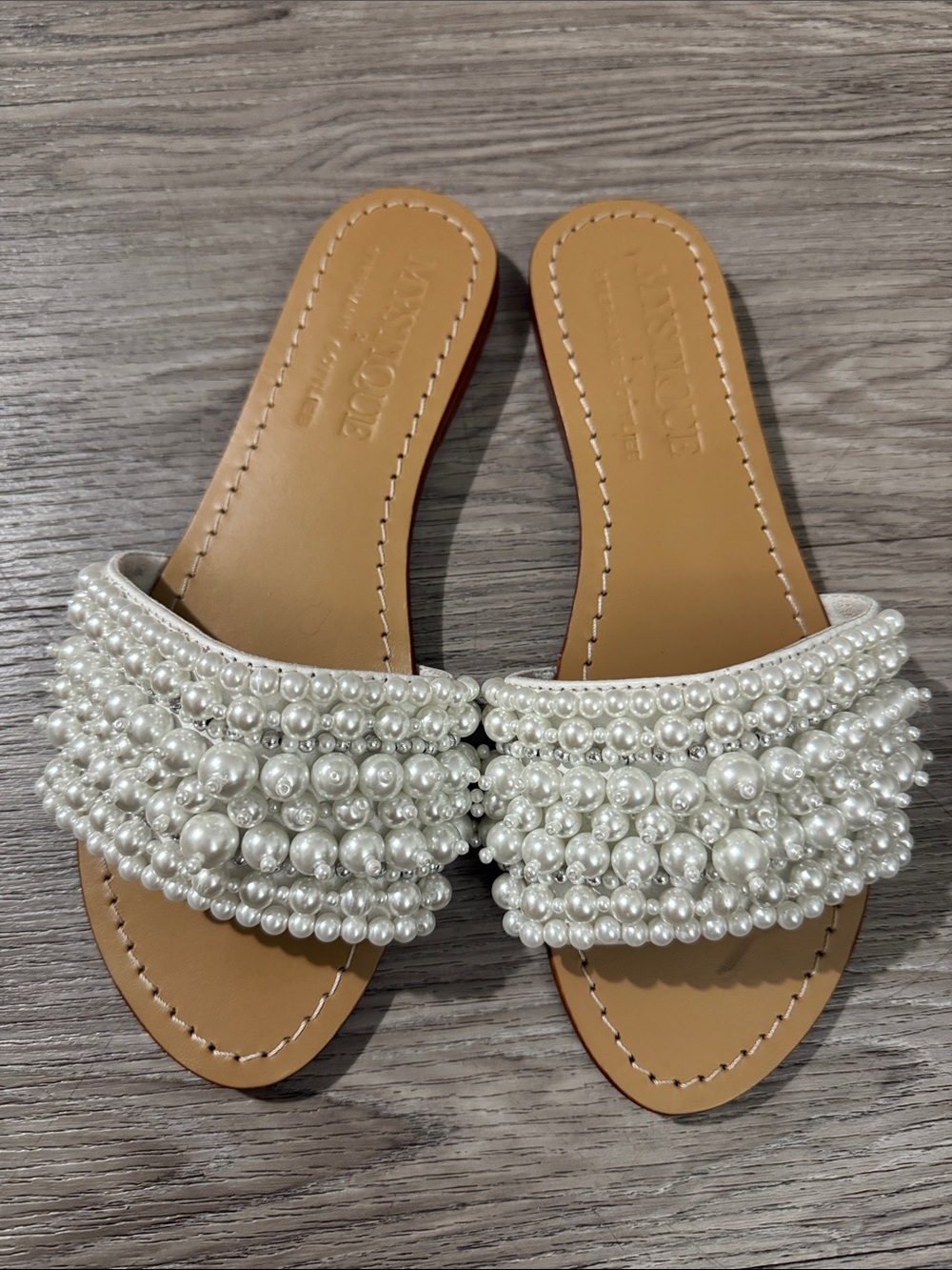 Gently worn Mystique pearl sandals. Missing one pearl- see  Sz 7